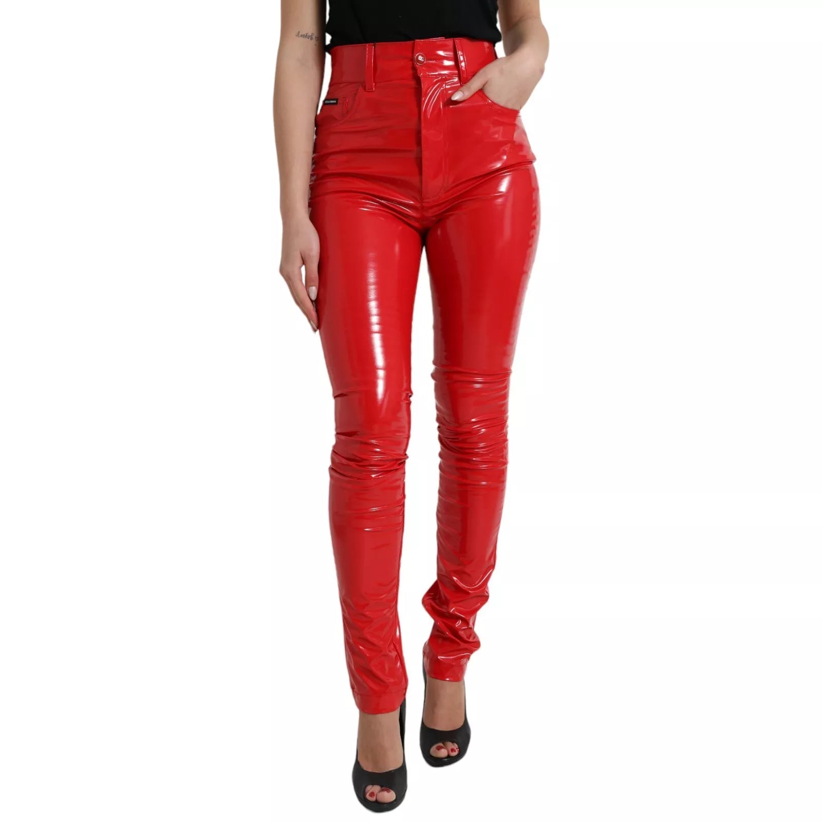 Pantalon skinny rouge brillant à taille haute de Dolce & Gabbana, coupe ajustée et élégante, en tissu brillant.