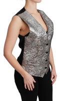 Top sans manches en brocart argenté de Dolce & Gabbana, pièce élégante en tissu métallique brillant.