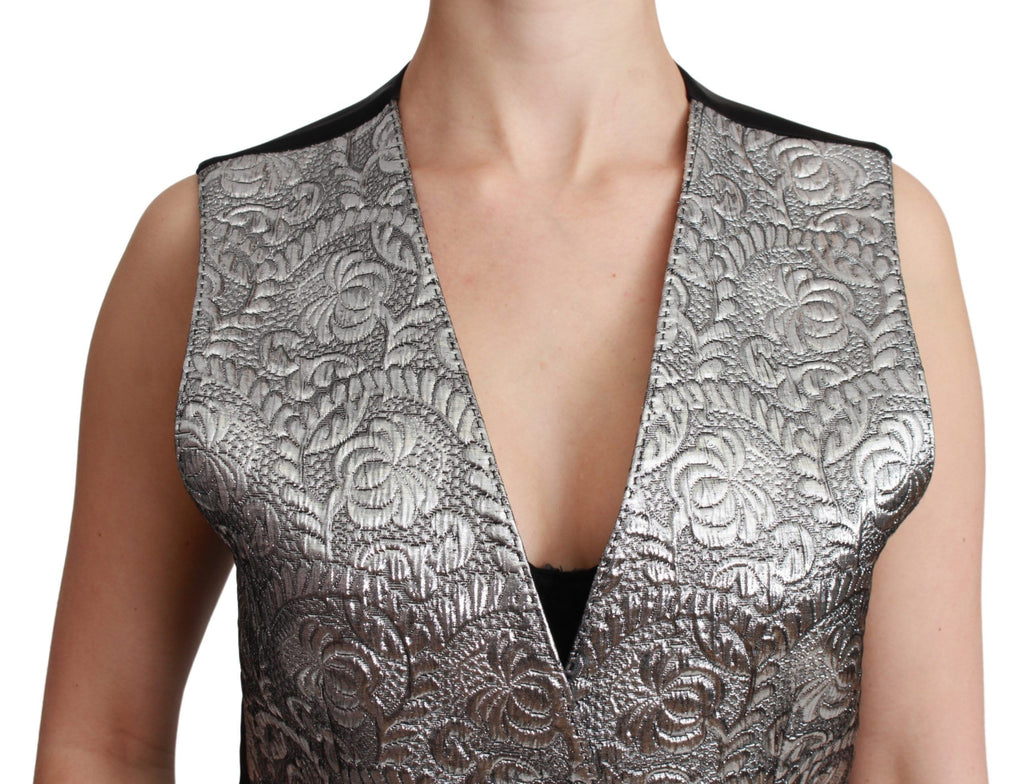 Haut sans manches en brocart argenté de Dolce & Gabbana, tissu métallique brillant, élégant et sophistiqué.