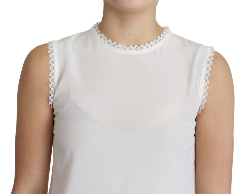 Haut sans manches en soie blanc Dolce & Gabbana avec broderie en dentelle, élégant et sophistiqué.