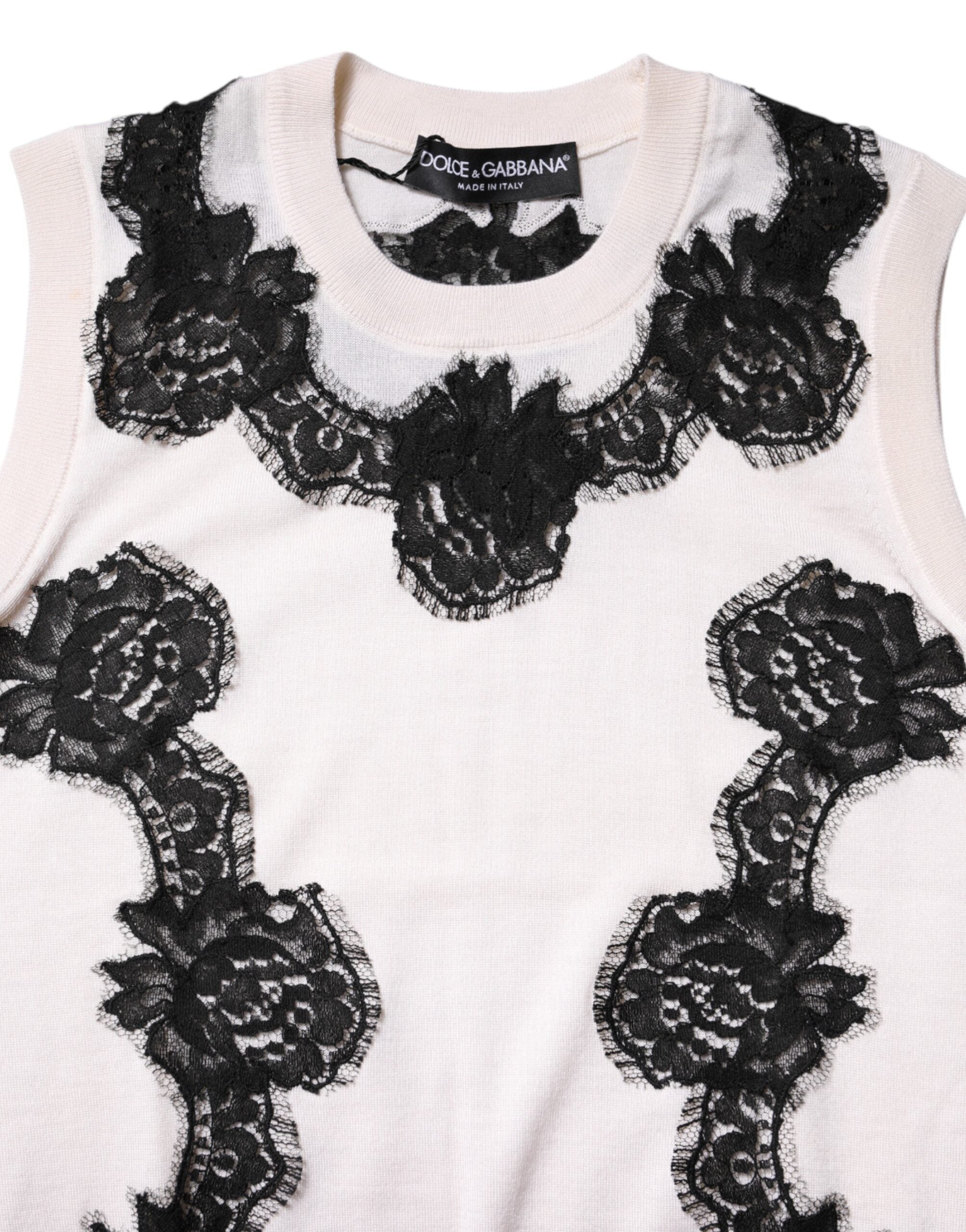 Débardeur blanc en cachemire Dolce & Gabbana avec détails en dentelle florale, style élégant et raffiné.