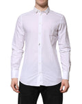 Chemise blanche en coton Dolce & Gabbana à manches longues, style formel avec détails en or.
