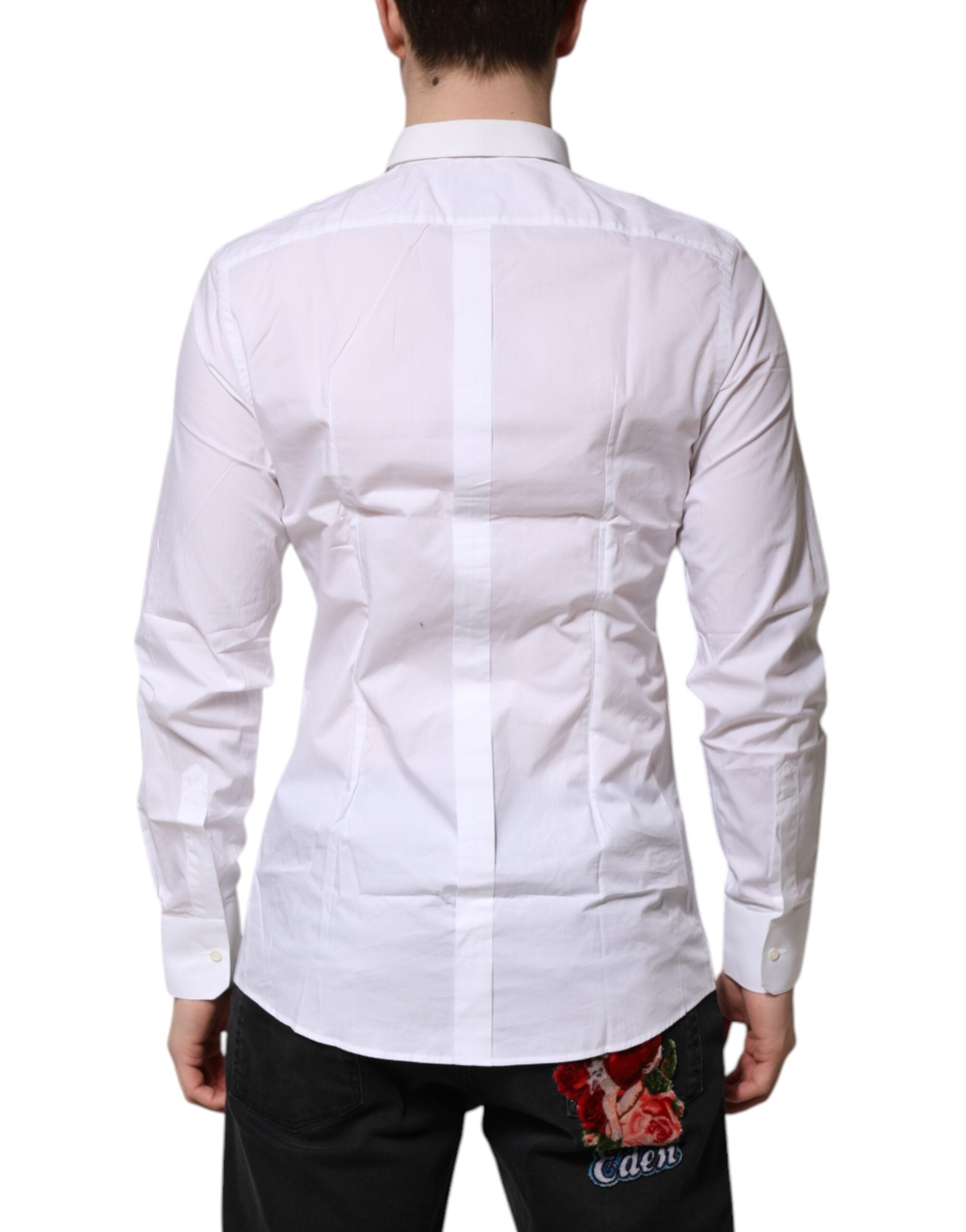 Chemise formelle blanche en coton Dolce & Gabbana avec manches longues et détails dorés, élégante et sophistiquée.