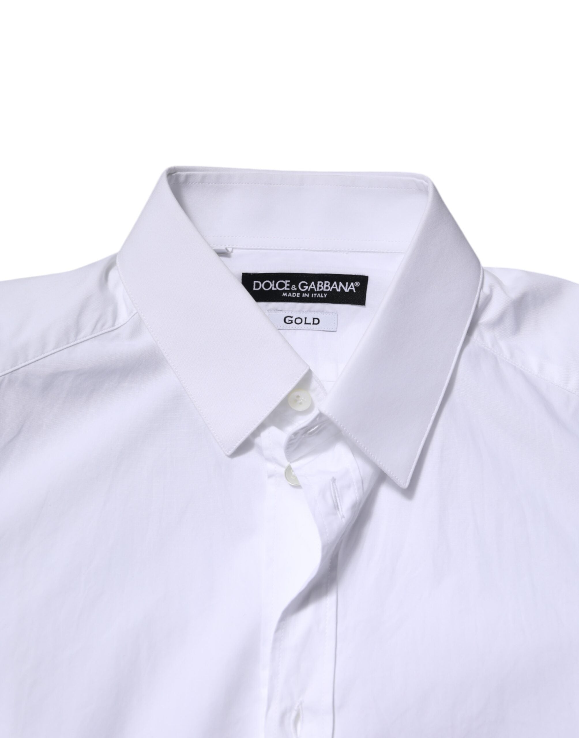 Chemise formelle blanche en coton Dolce & Gabbana avec manches longues et détails dorés, élégante et sophistiquée.