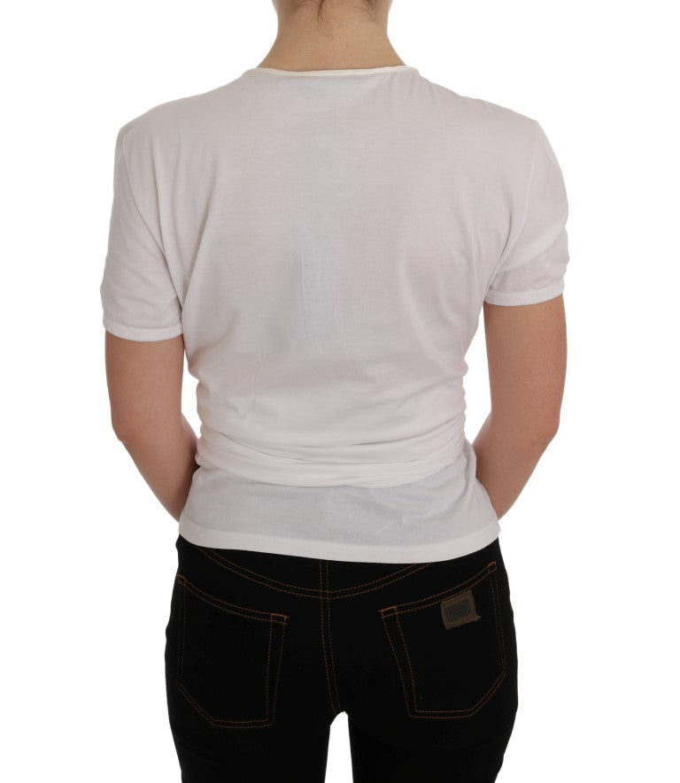 T-shirt en coton et soie blanc Dolce & Gabbana porté par un mannequin, détail du tissu et coupe élégante visible.