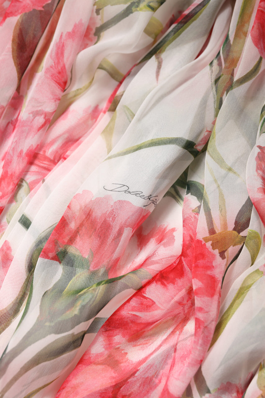 Robe maxi en soie blanche à fleurs avec encolure halter, robe A-line élégante de Dolce & Gabbana.