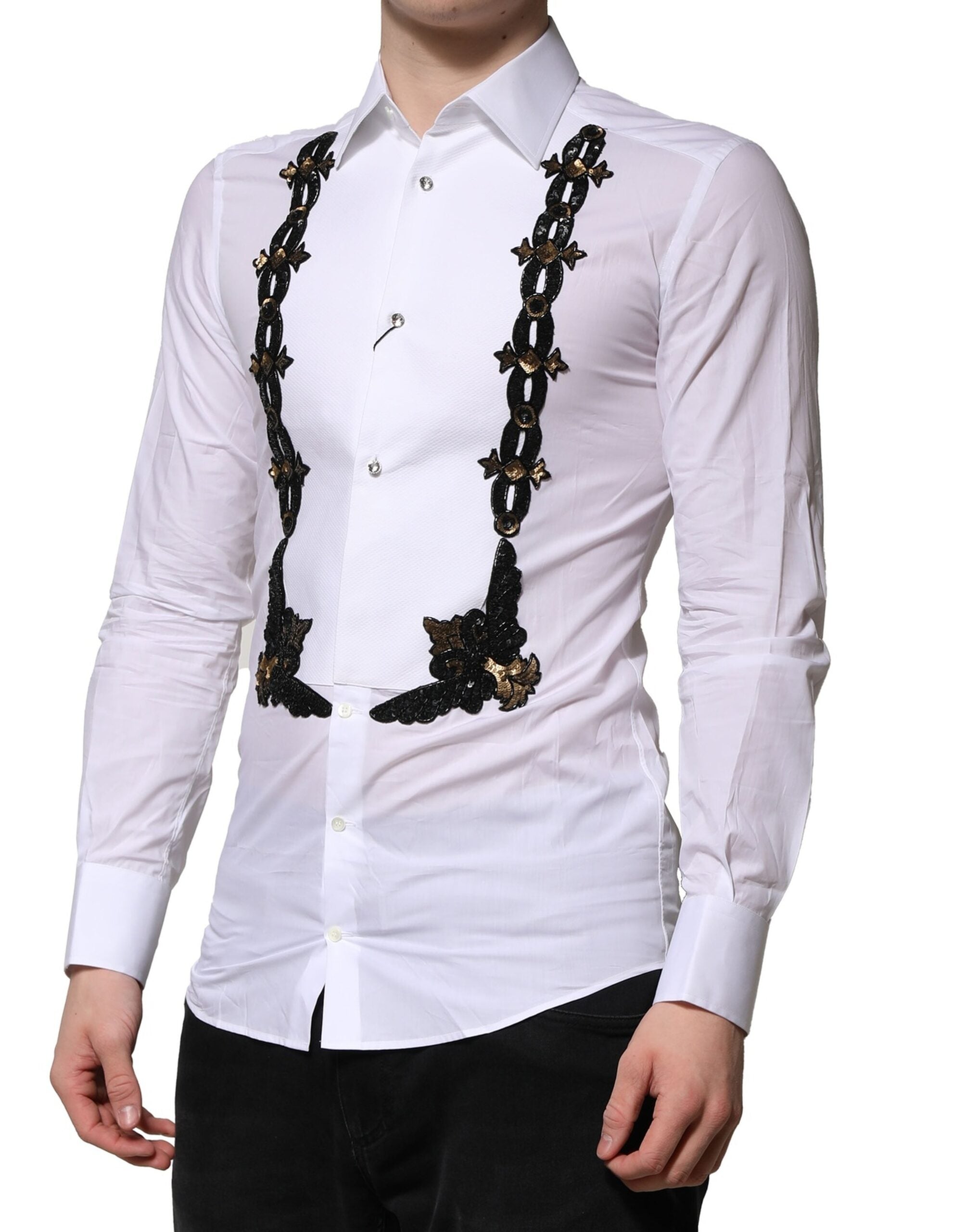 Chemise formelle blanche pour homme Dolce & Gabbana avec embellissements dorés, détails élégants et tissu de qualité.