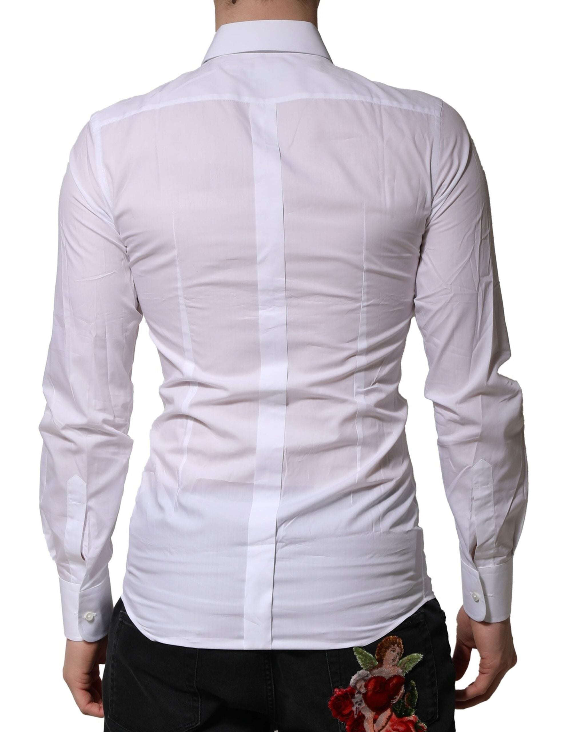Chemise formelle blanche pour homme Dolce & Gabbana avec ornementations dorées, détails élégants et tissu de qualité.
