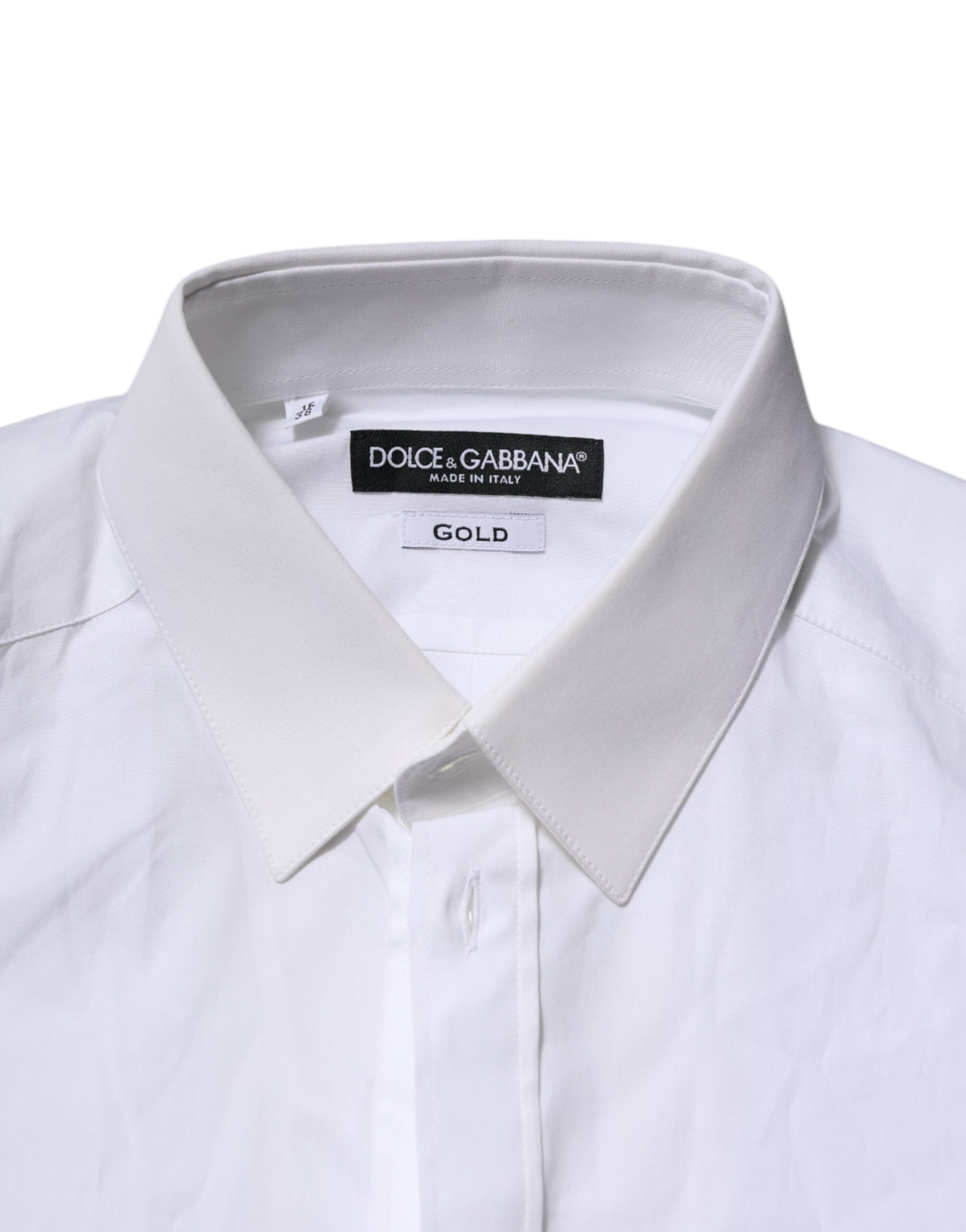 Chemise formelle blanche Dolce & Gabbana à manches longues avec détails dorés, élégante et sophistiquée.