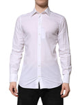 Chemise formelle Dolce & Gabbana blanc à manches longues avec détails en or pour homme, style élégant et sophistiqué.