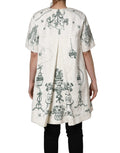 Manteau en jacquard blanc à motif floral jardin de Dolce & Gabbana, veste élégante avec détails sophistiqués.