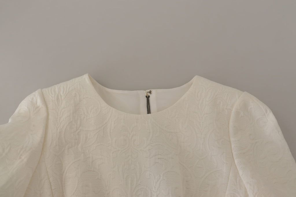 Robe midi en jacquard floral blanc de Dolce & Gabbana, robe ajustée en brocart avec motif floral élégant.