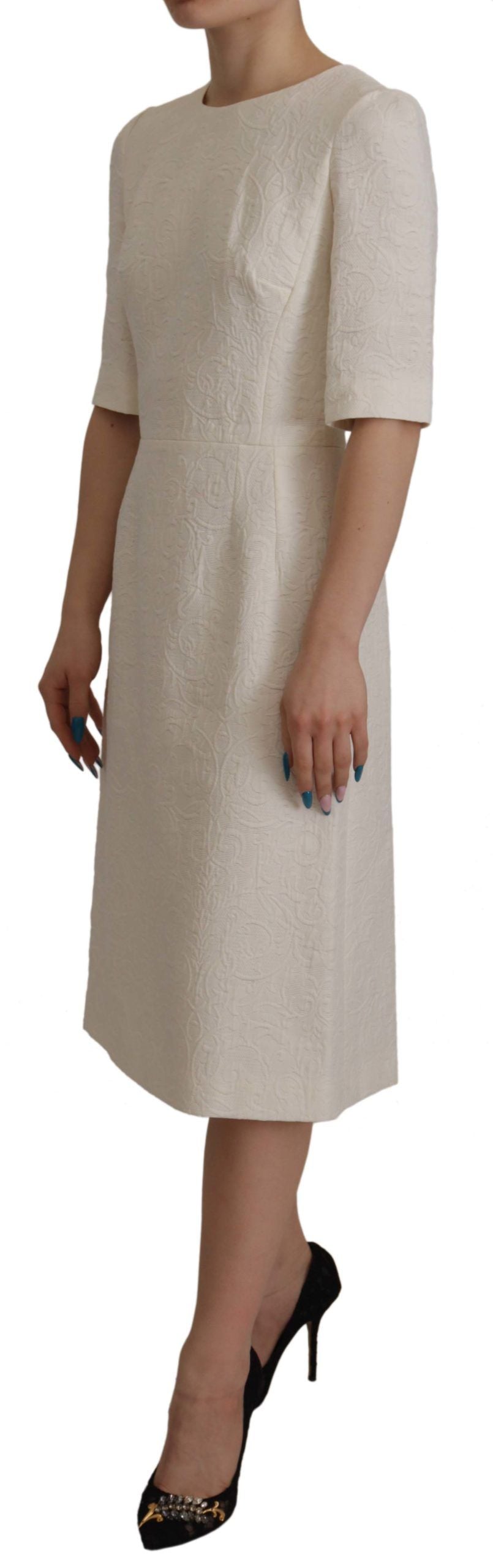Robe courte en jacquard blanc Dolce & Gabbana à motifs floraux, coupe ajustée et élégante.