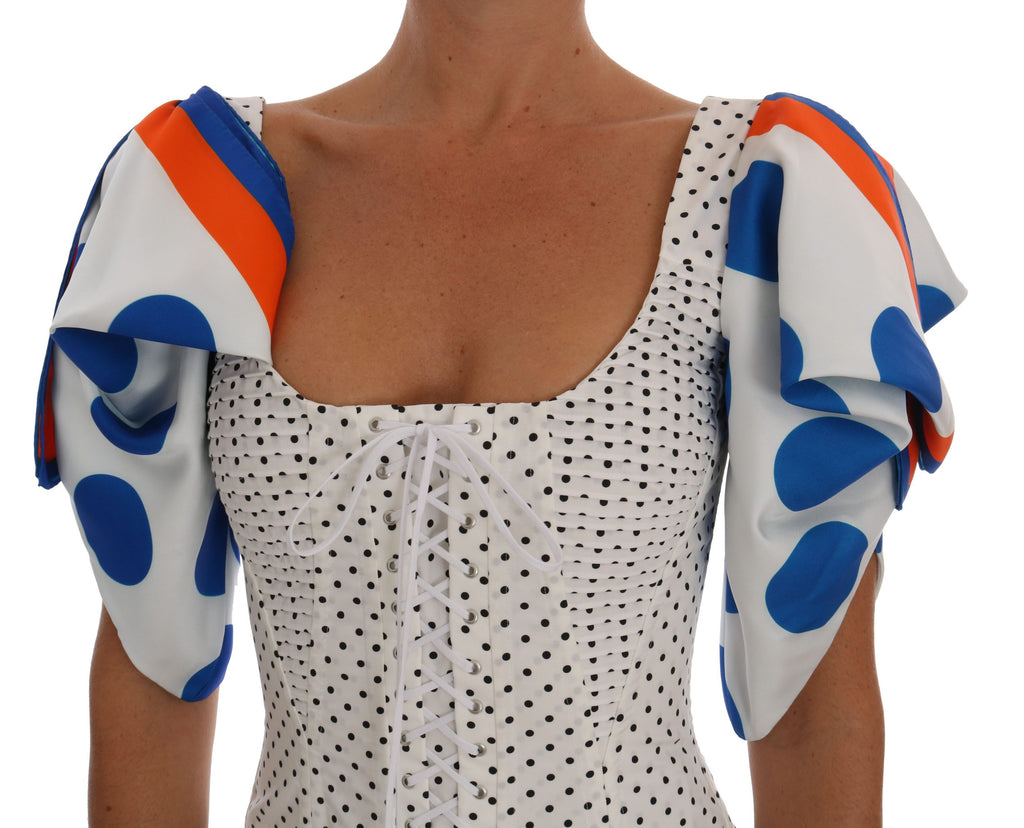 Corset bustier en soie blanche à pois Dolce & Gabbana, haut élégant avec détails raffinés et style sophistiqué.