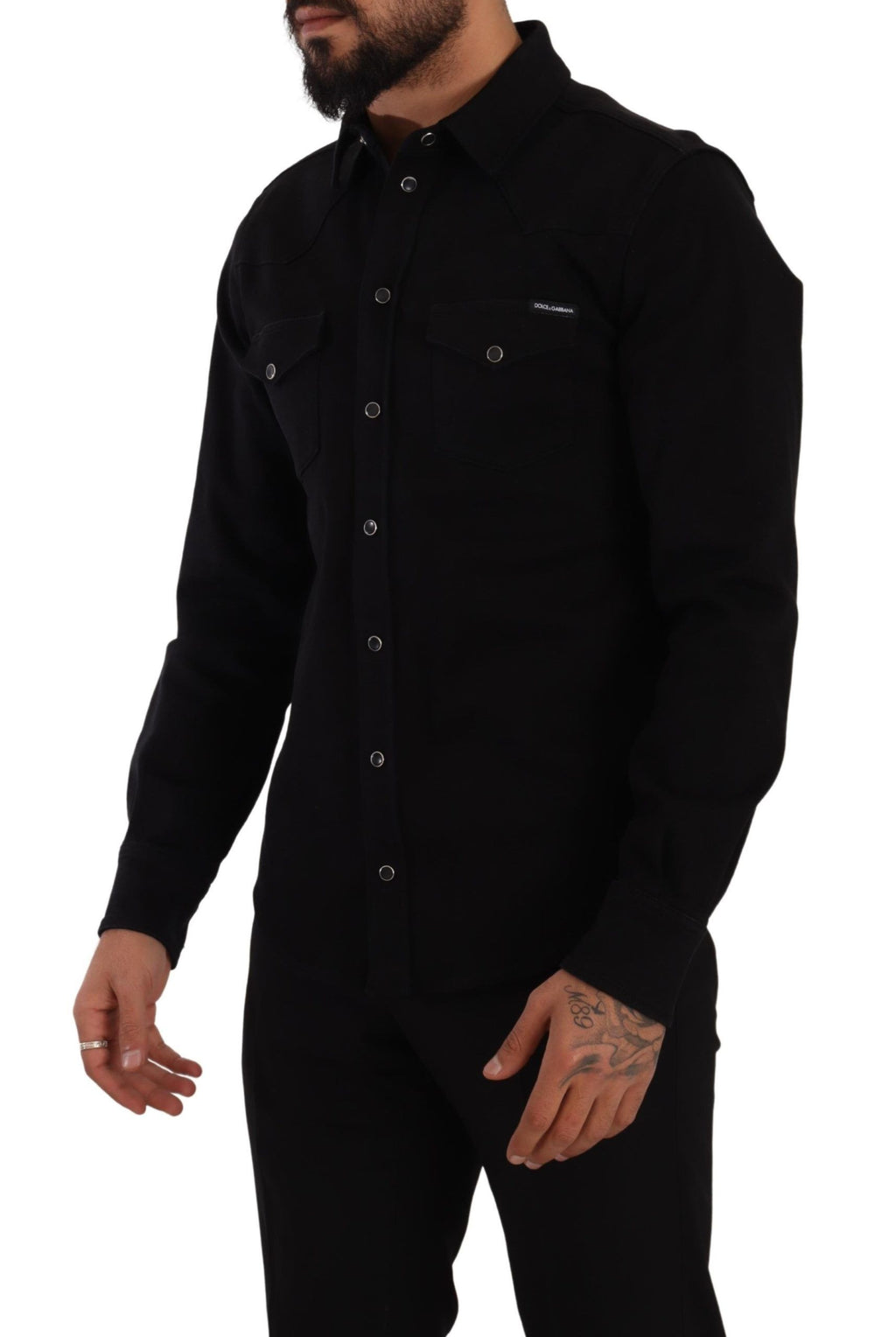 Chemise slim en denim coton stretch noir Dolce & Gabbana, détails élégants et coupe ajustée visible sur l'image.