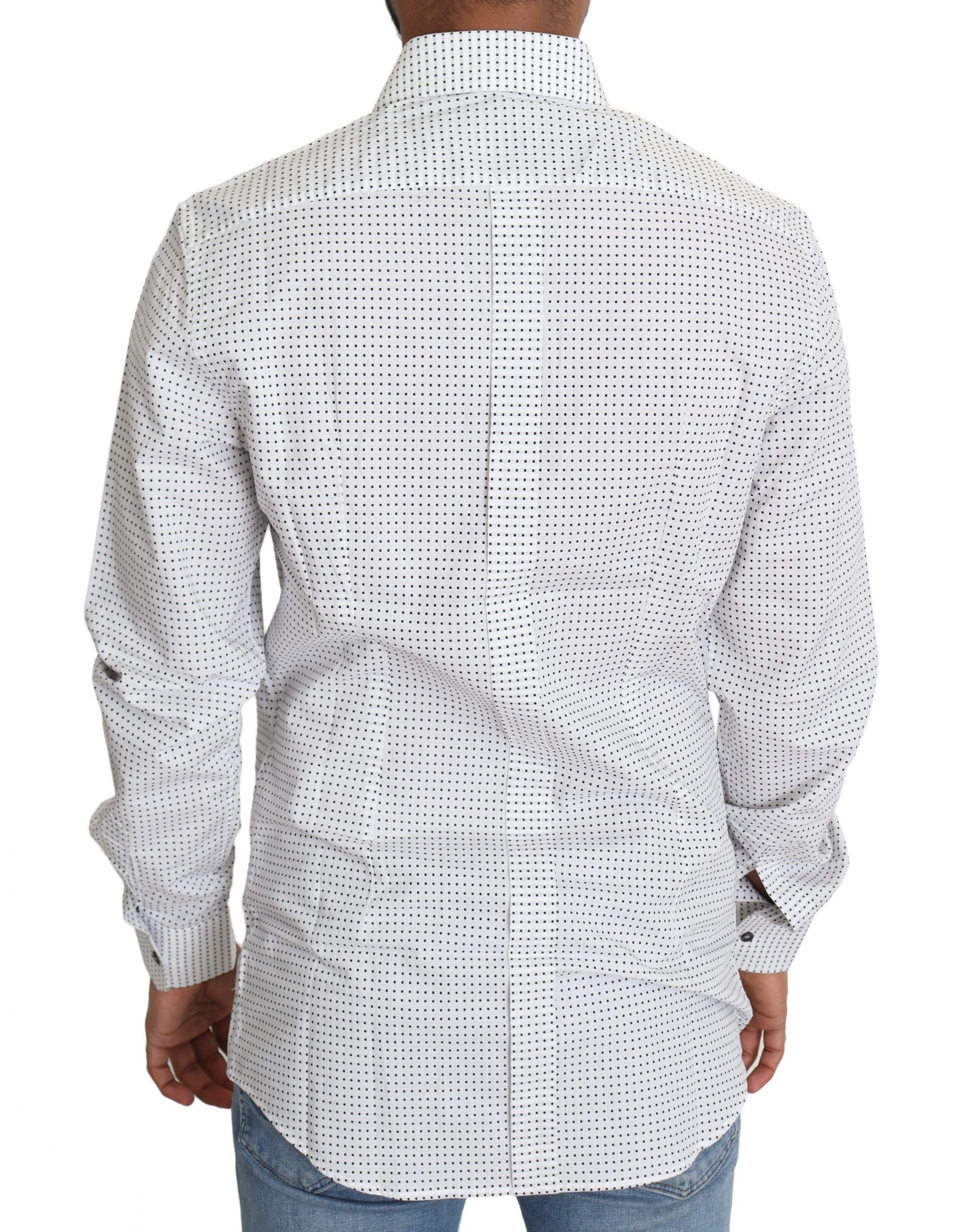 Chemise Dolce & Gabbana à pois noirs et blancs, habillée, en coton, avec col classique et manches longues.
