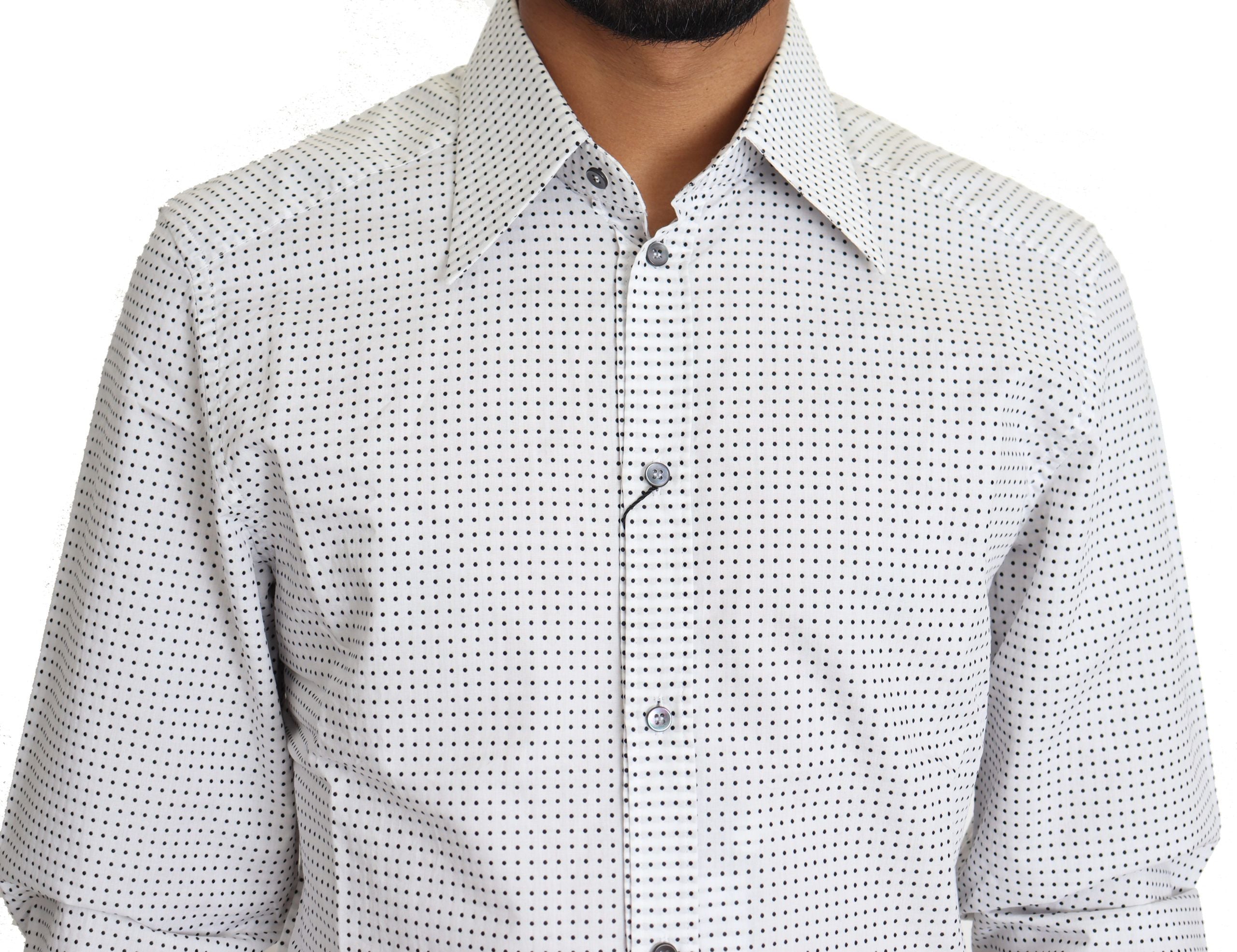 Chemise Dolce & Gabbana à pois noirs et blancs, élégante, en coton, avec col classique et manches longues.
