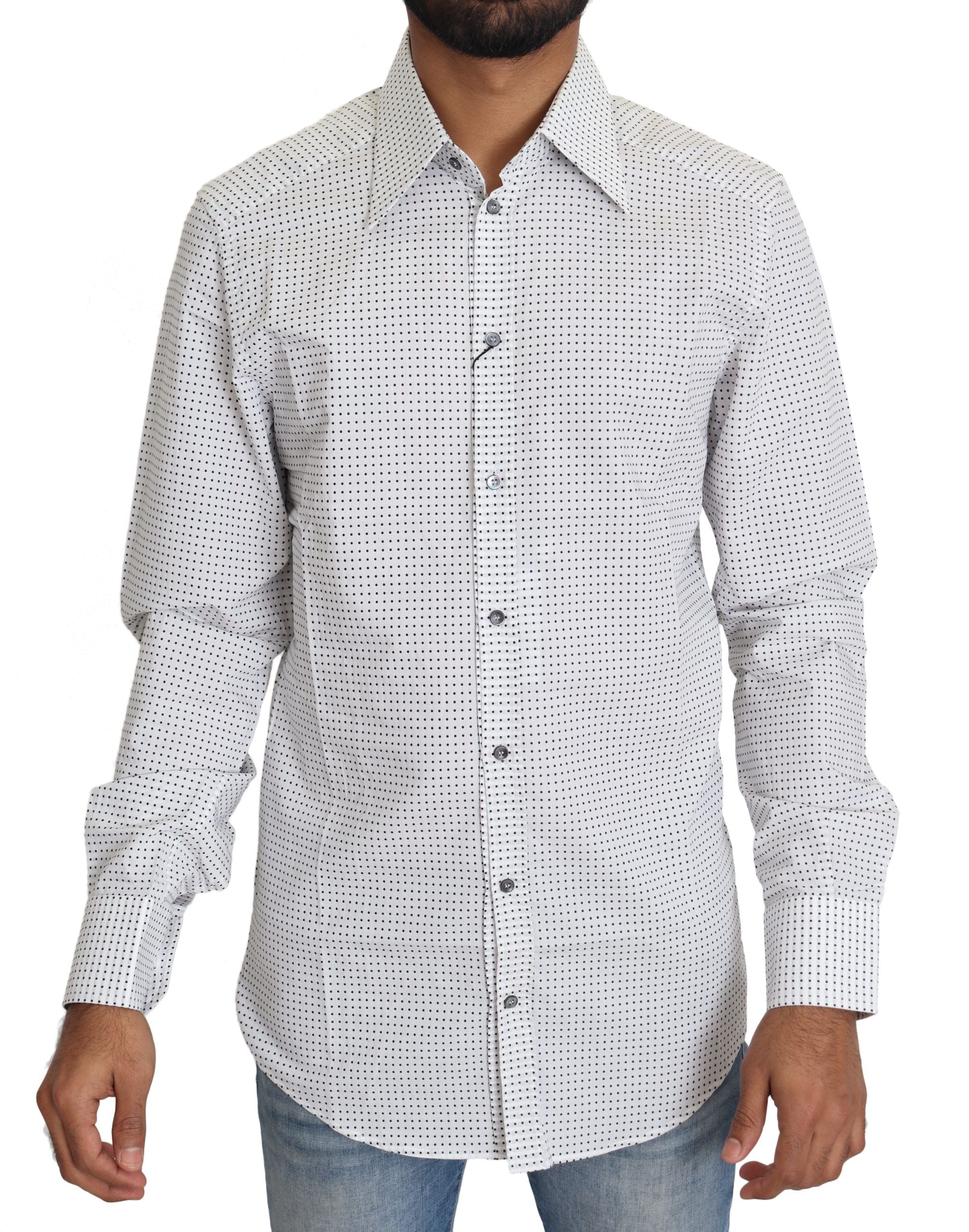 Chemise à pois noirs et blancs Dolce & Gabbana, style élégant avec col classique et manches longues, vue de face.