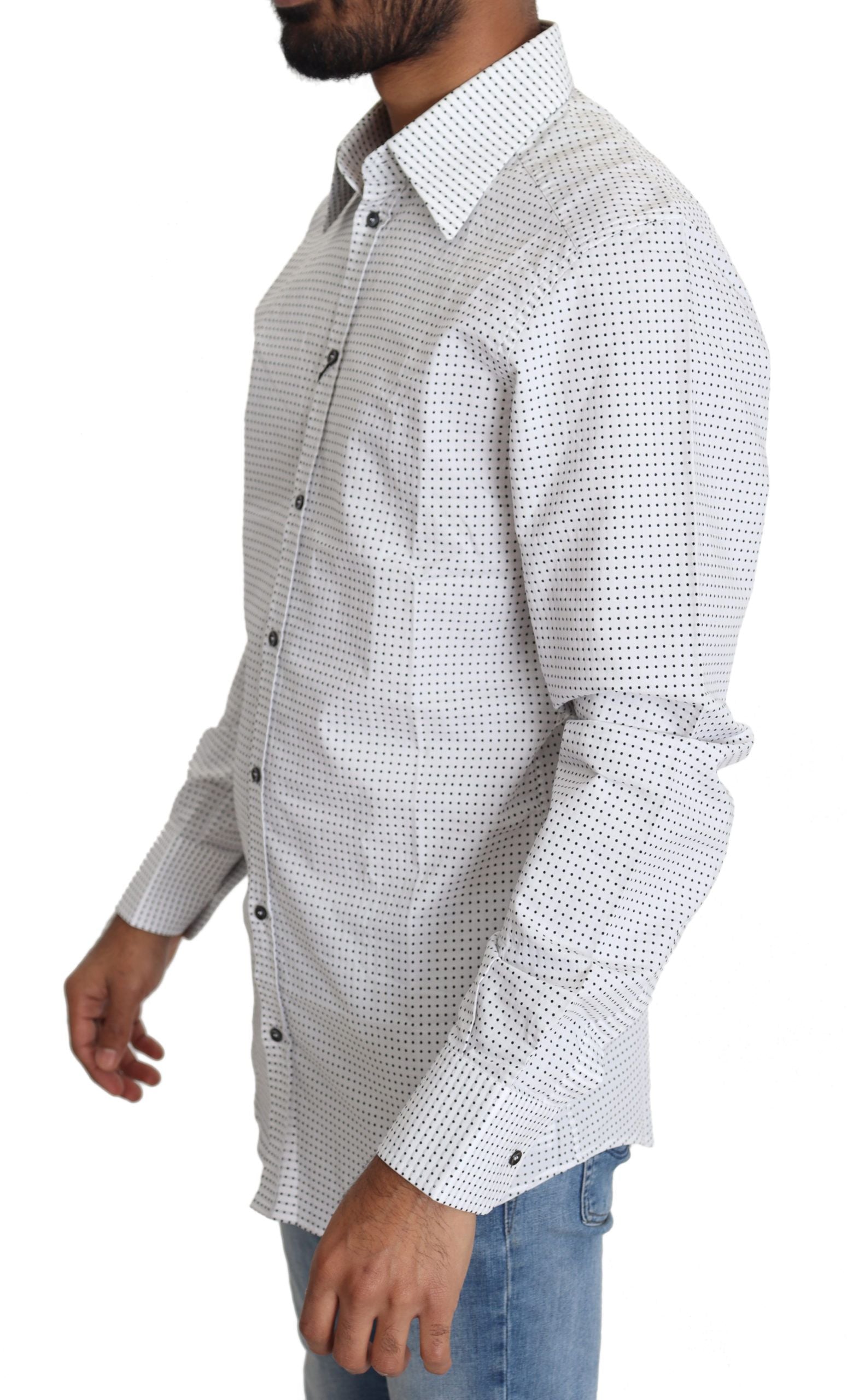 Chemise Dolce & Gabbana à pois noirs et blancs, élégante, en coton, avec col classique et manches longues.