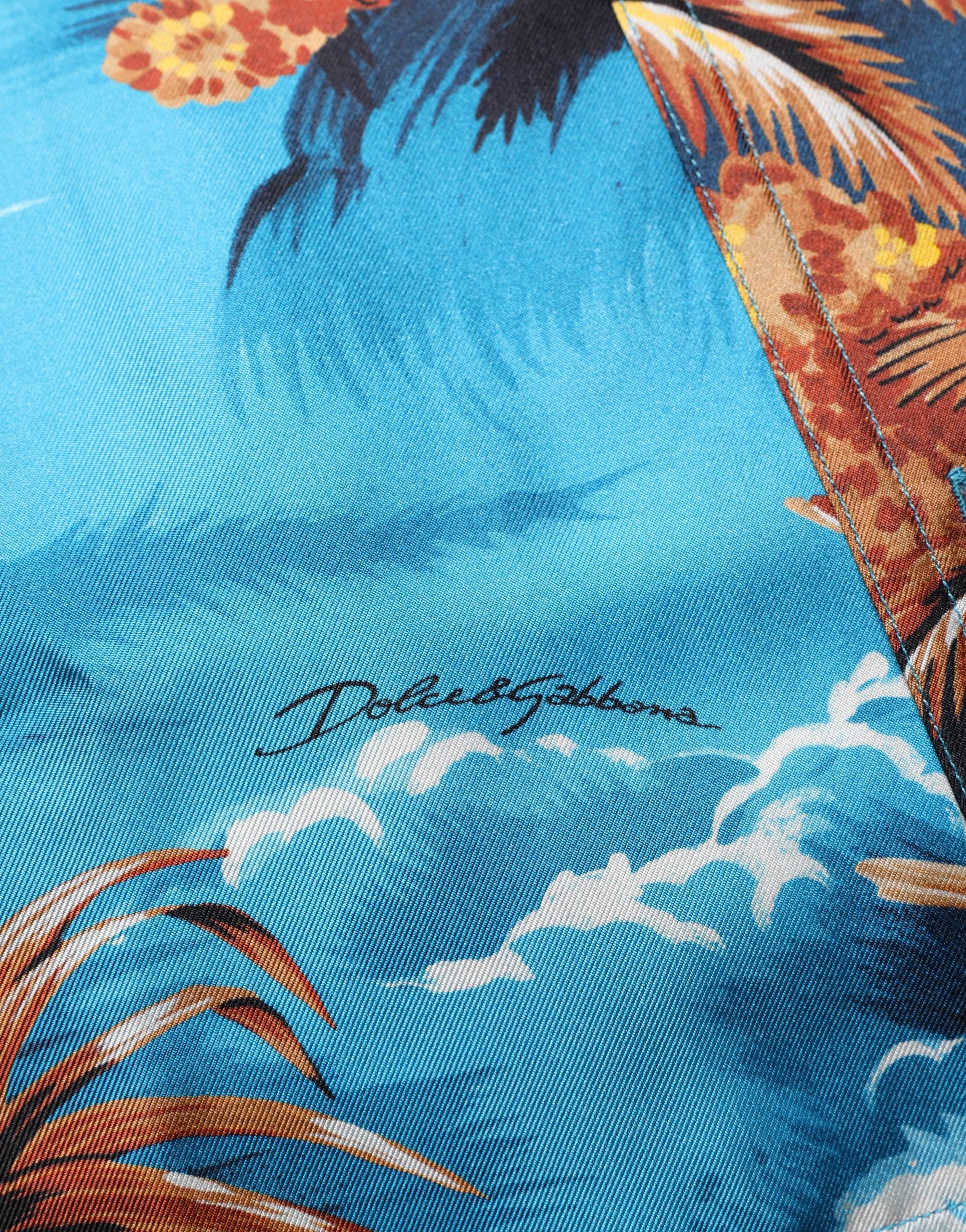 Chemise en soie bleue Dolce & Gabbana avec motif hawaïen graphique, en twill léger et élégant.