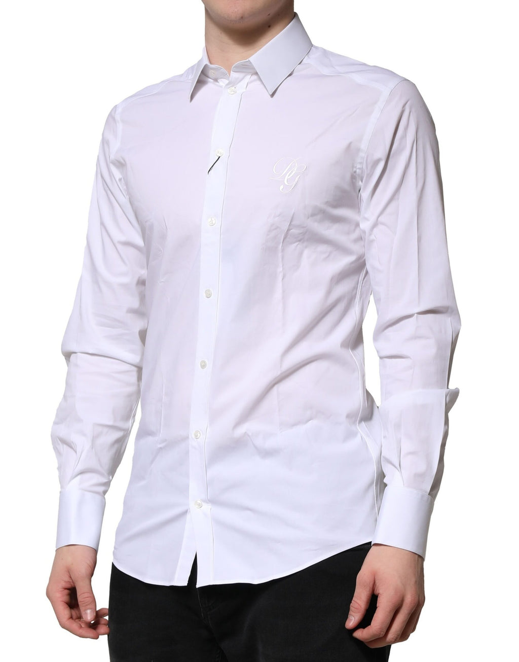Chemise formelle blanche en coton Dolce & Gabbana avec manches longues et détails dorés visibles sur l'image.