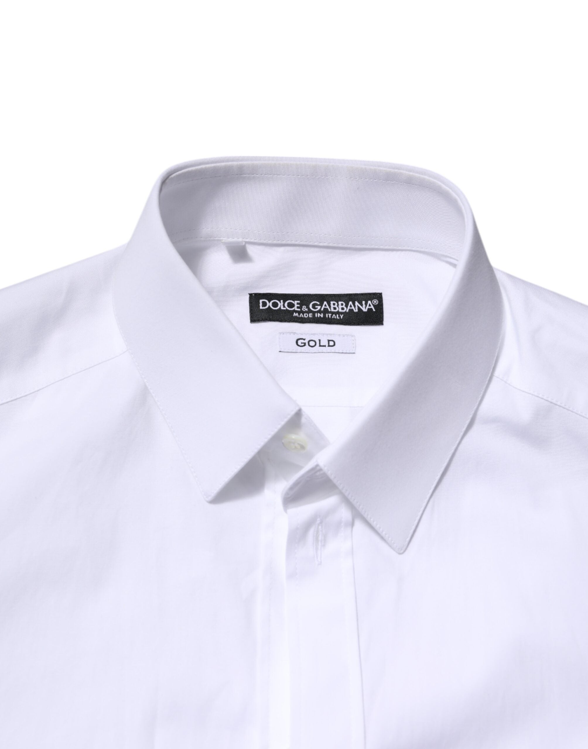 Chemise formelle en coton blanc Dolce & Gabbana à manches longues avec détails dorés, vue de face.