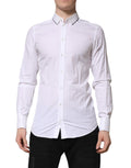 Chemise blanche en coton Dolce & Gabbana à manches longues, élégante et formelle, avec détails en or.