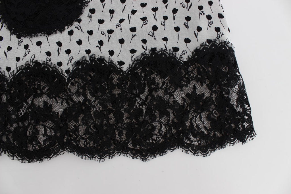 Lingerie Babydoll en soie noire avec dentelle, Dolce & Gabbana, vue de face avec détails délicats.