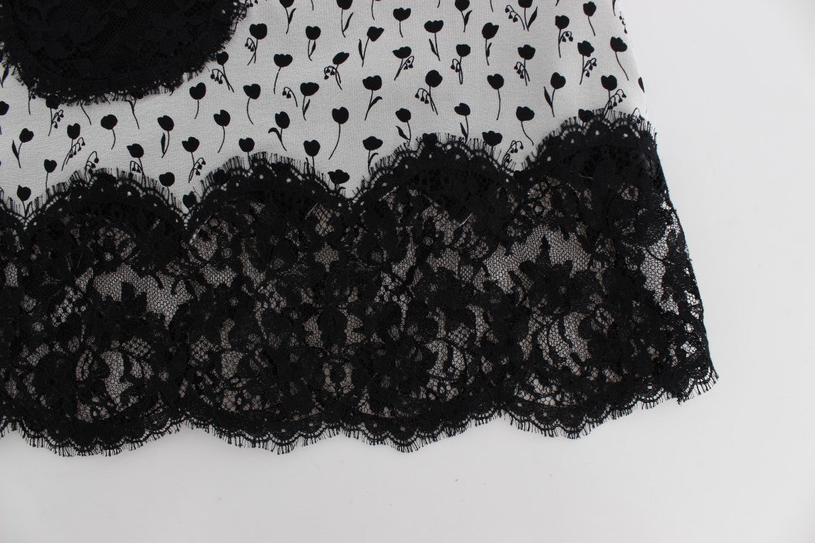 Lingerie Babydoll en soie noire avec dentelle, Dolce & Gabbana, vue de face avec détails délicats.