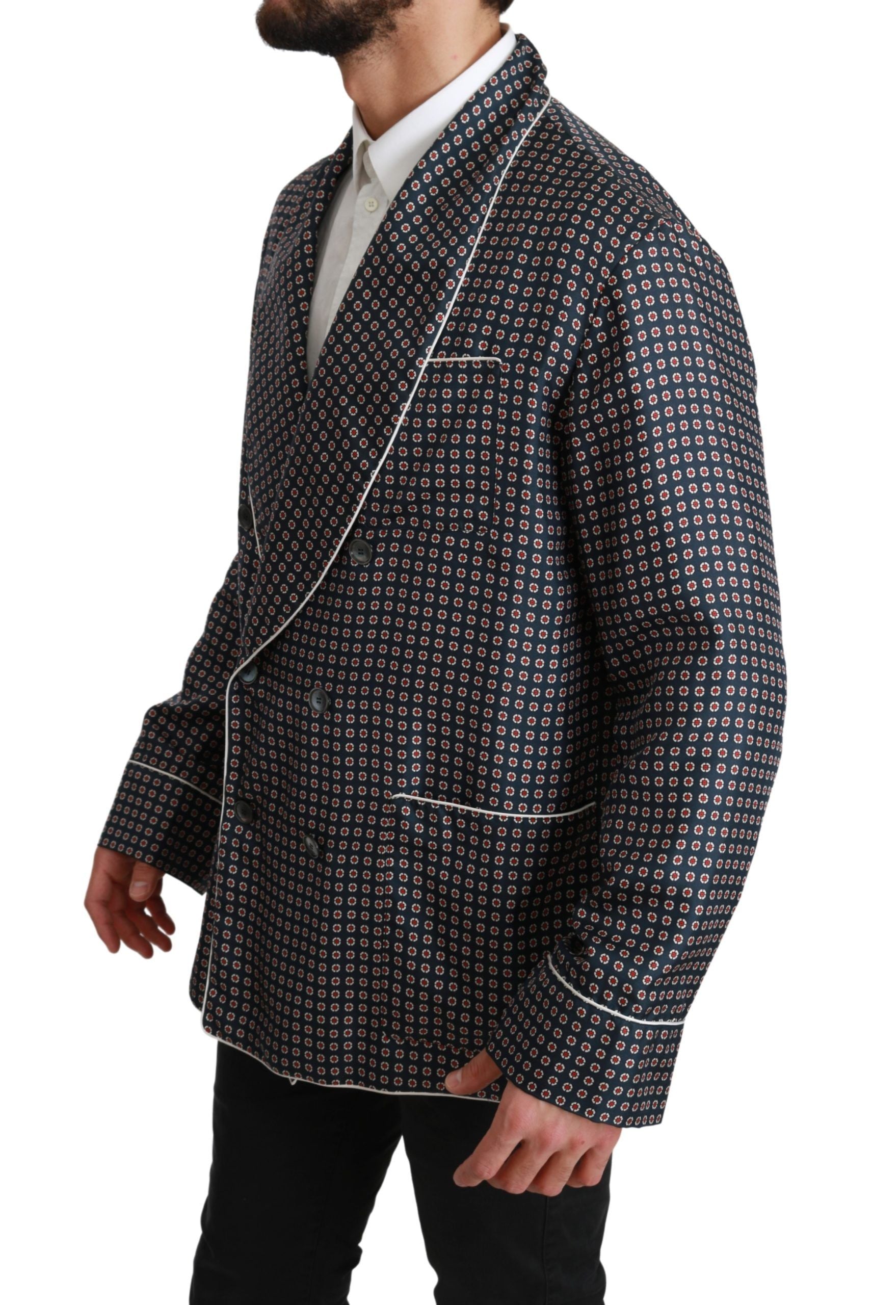 Manteau double boutonnage bleu marine à motif de Dolce & Gabbana, veste élégante en tissu sophistiqué, visible sur l'image.