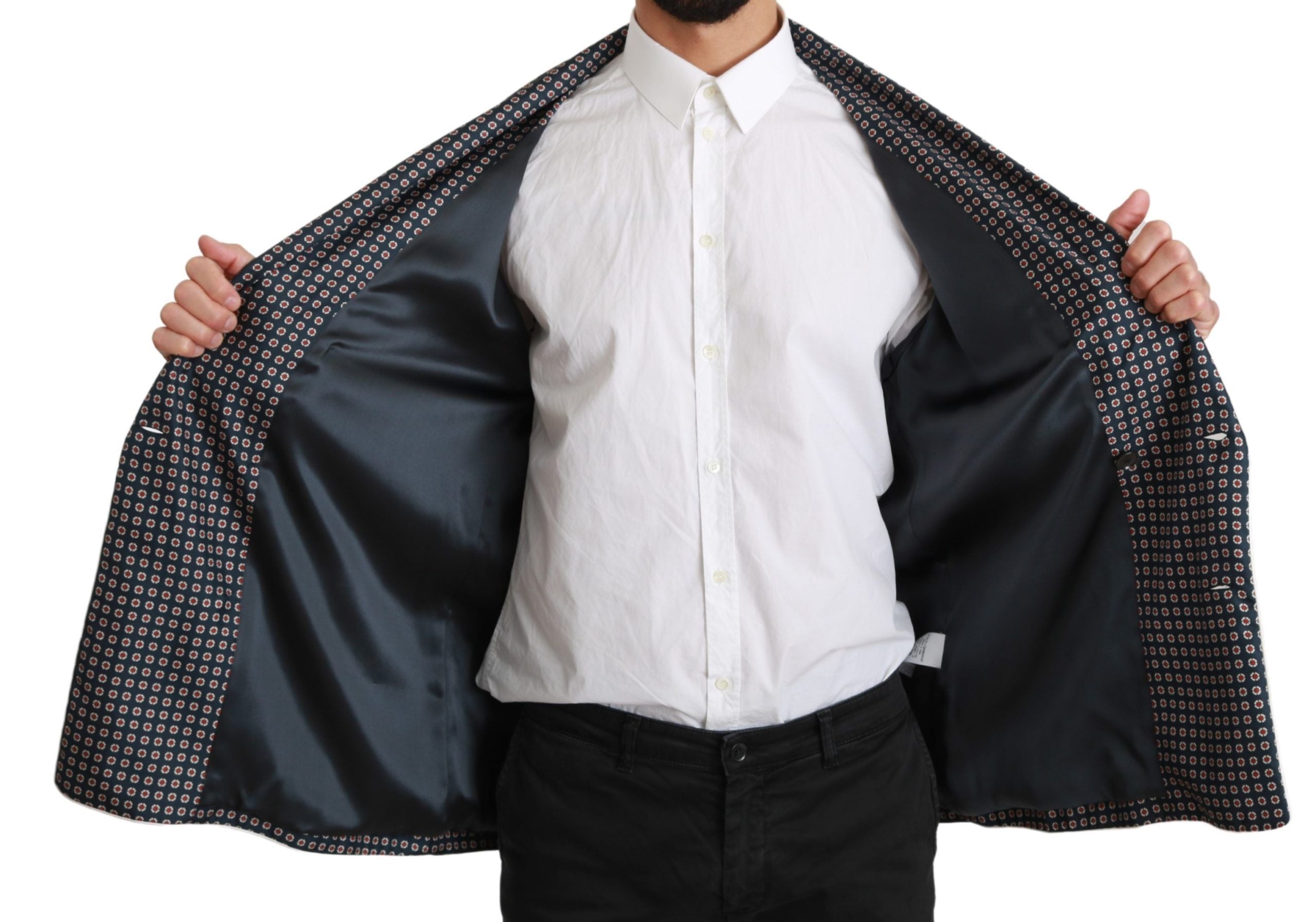Manteau double boutonnage élégant Dolce & Gabbana bleu marine avec motif, porté en vue frontale.