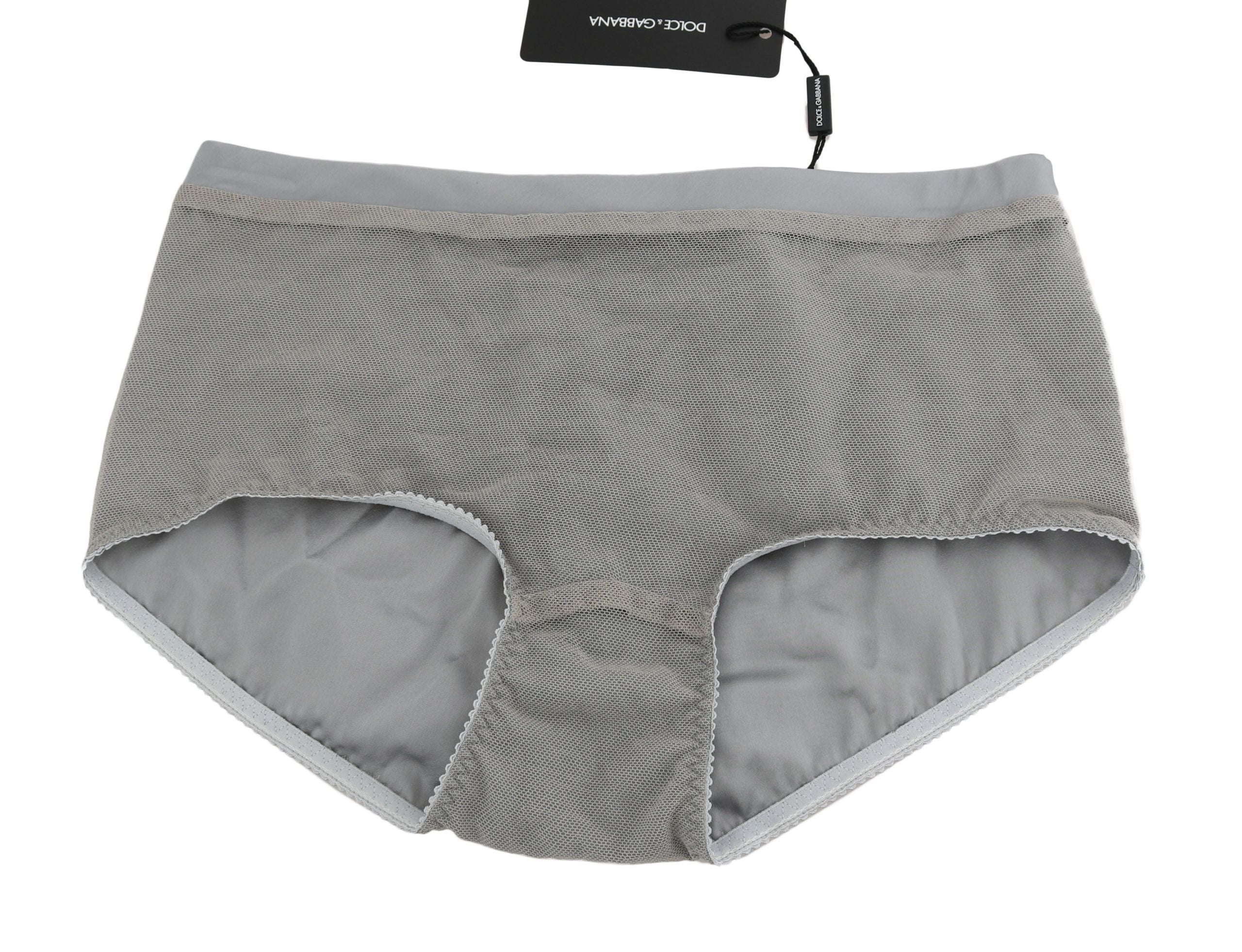 Sous-vêtements Dolce & Gabbana en argent avec bas en filet en soie, détails élégants et tissu léger visible dans l'image.
