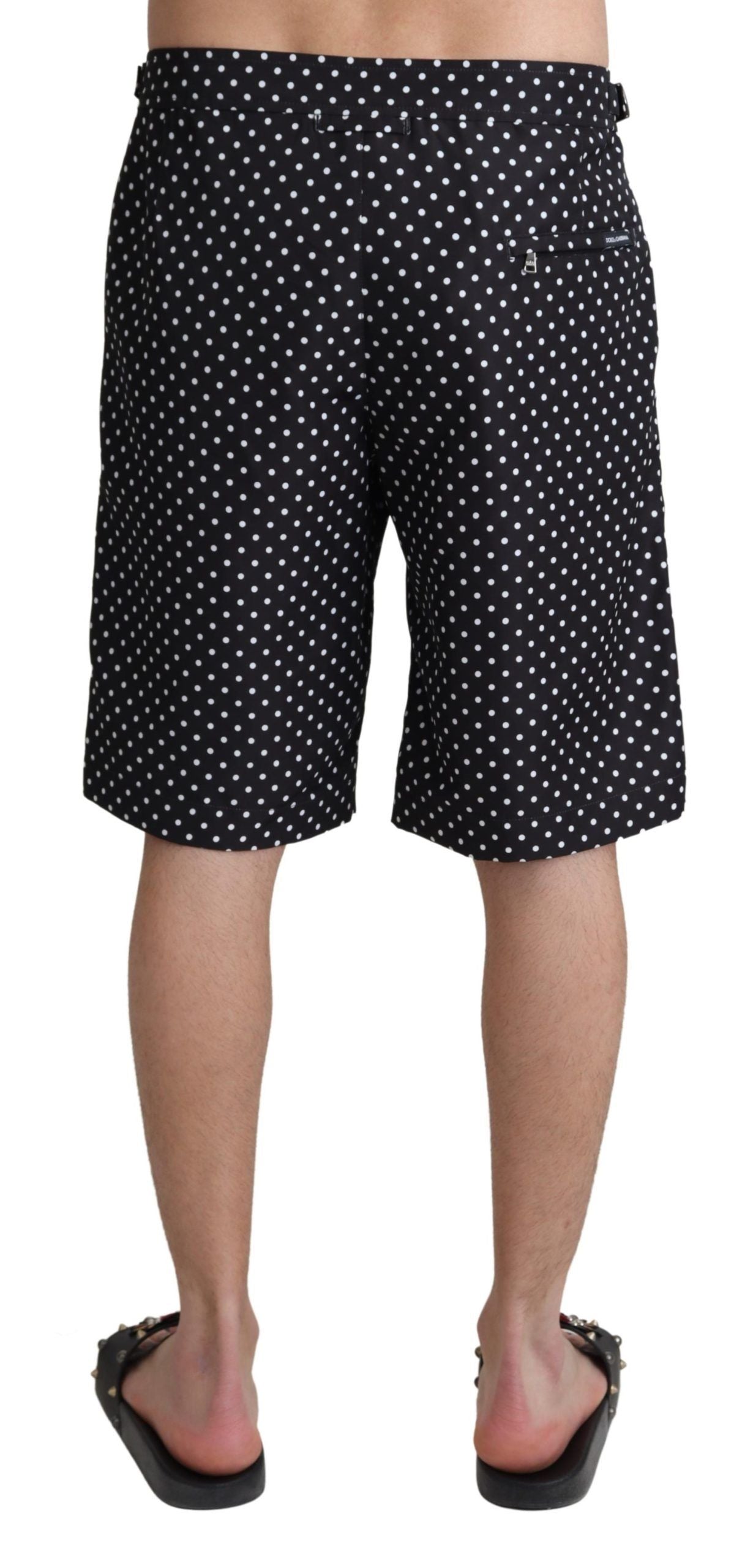 Shorts de bain Dolce & Gabbana à pois noirs, vêtement de plage pour femme avec motif à pois, en tissu léger.