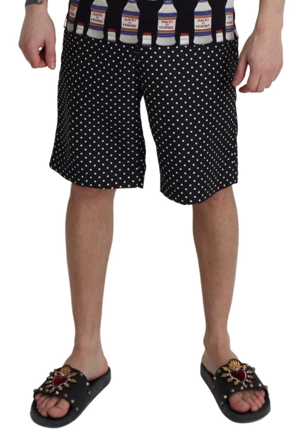Shorts de bain noirs à pois Dolce & Gabbana, maillot de bain plage élégante pour femmes, détails en tissu léger.
