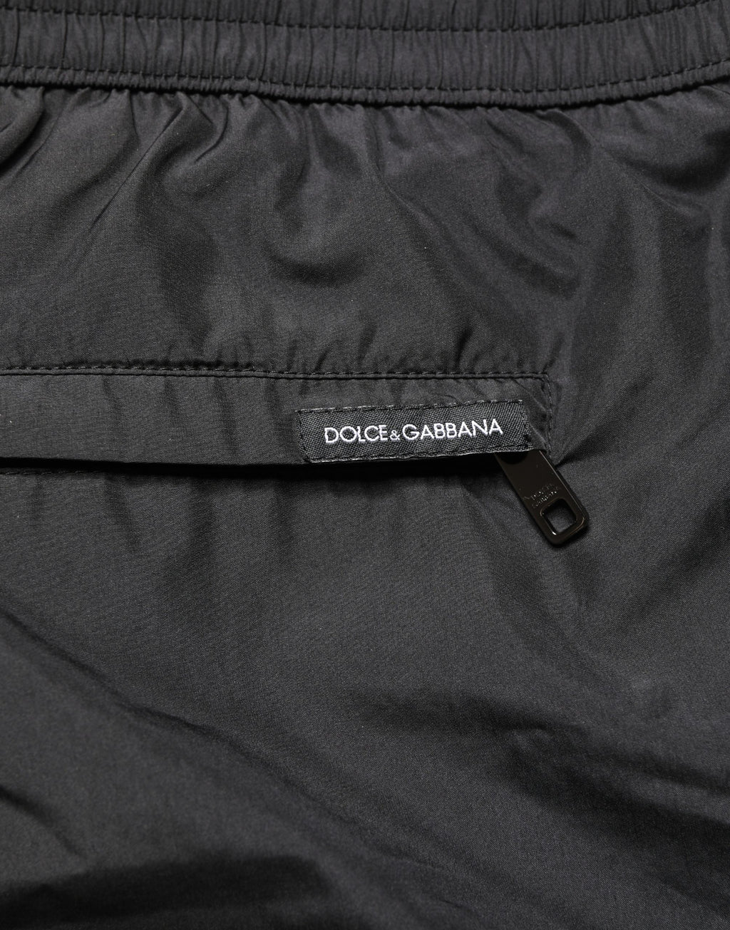 Shorts de bain homme Dolce & Gabbana en polyester noir avec cordon de serrage, style décontracté et confortable.