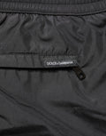 Shorts de bain homme Dolce & Gabbana en polyester noir avec cordon de serrage, style décontracté et confortable.