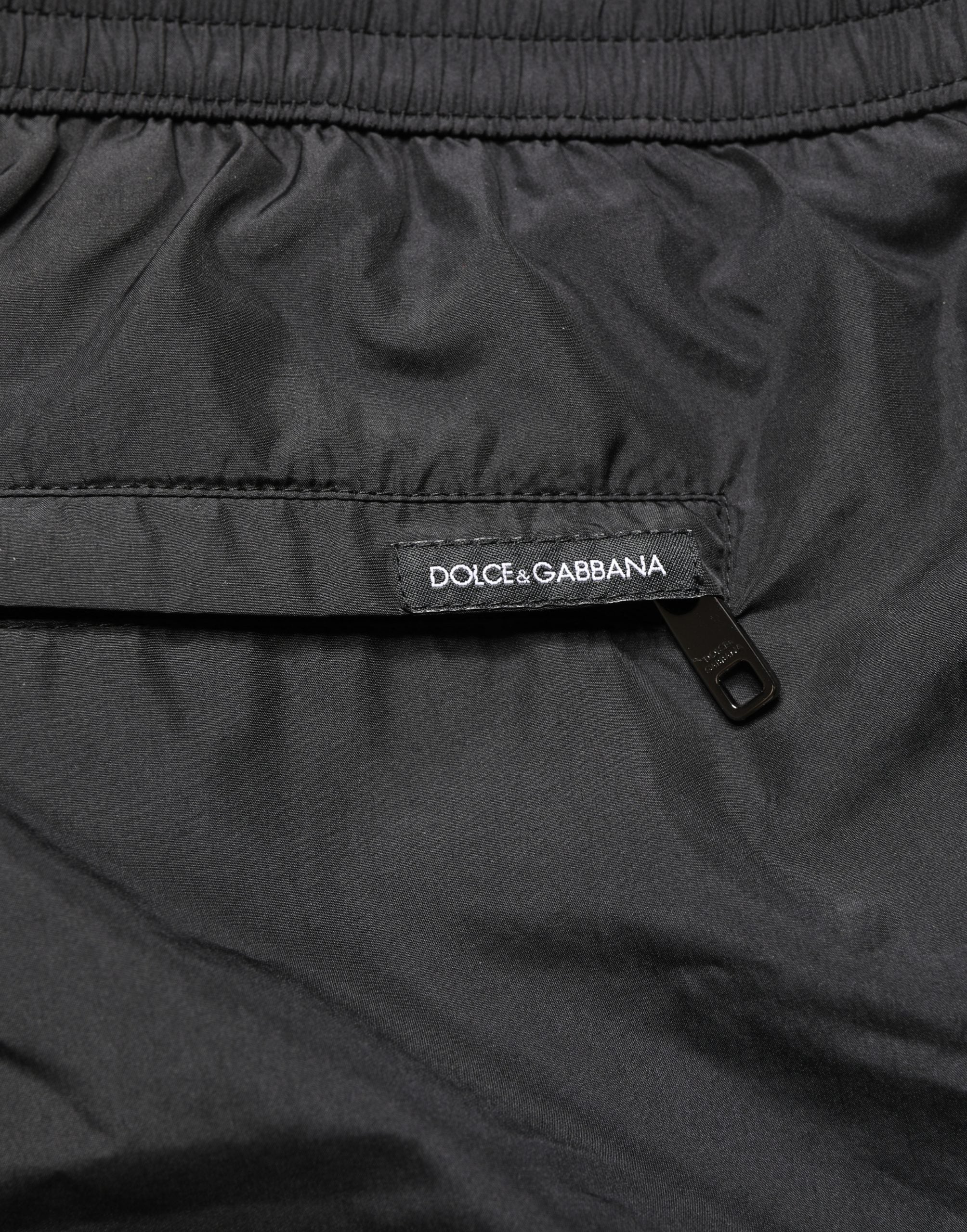 Shorts de bain homme Dolce & Gabbana en polyester noir avec cordon de serrage, style décontracté et confortable.