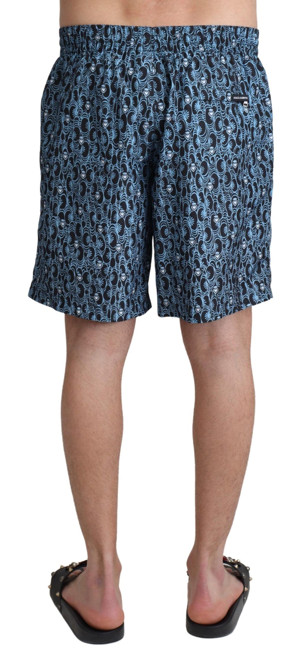 Shorts de bain Dolce & Gabbana à motif bleu pour plage, maillot de bain léger et coloré, en tissu fluide.