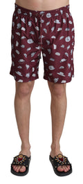 Shorts de bain Dolce & Gabbana à imprimé chapeaux maroon pour plage et natation, style élégant et confortable.