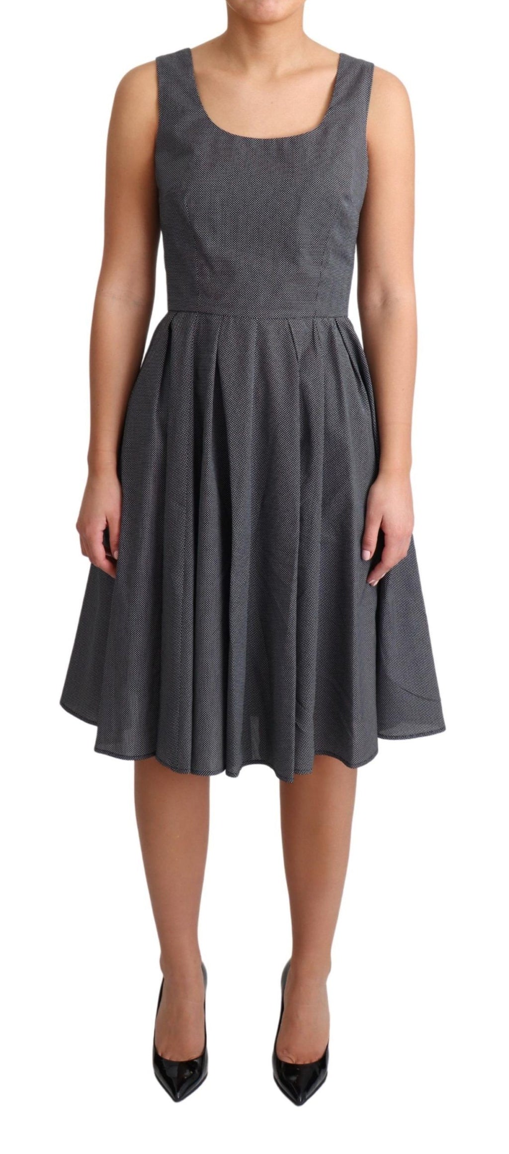 Robe trapèze en coton noir à pois Dolce & Gabbana, vêtement élégant avec motif à pois pour femme.