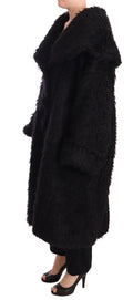 Cape trench en mohair noir de Dolce & Gabbana, élégant manteau avec détails en fourrure et coupe sophistiquée.