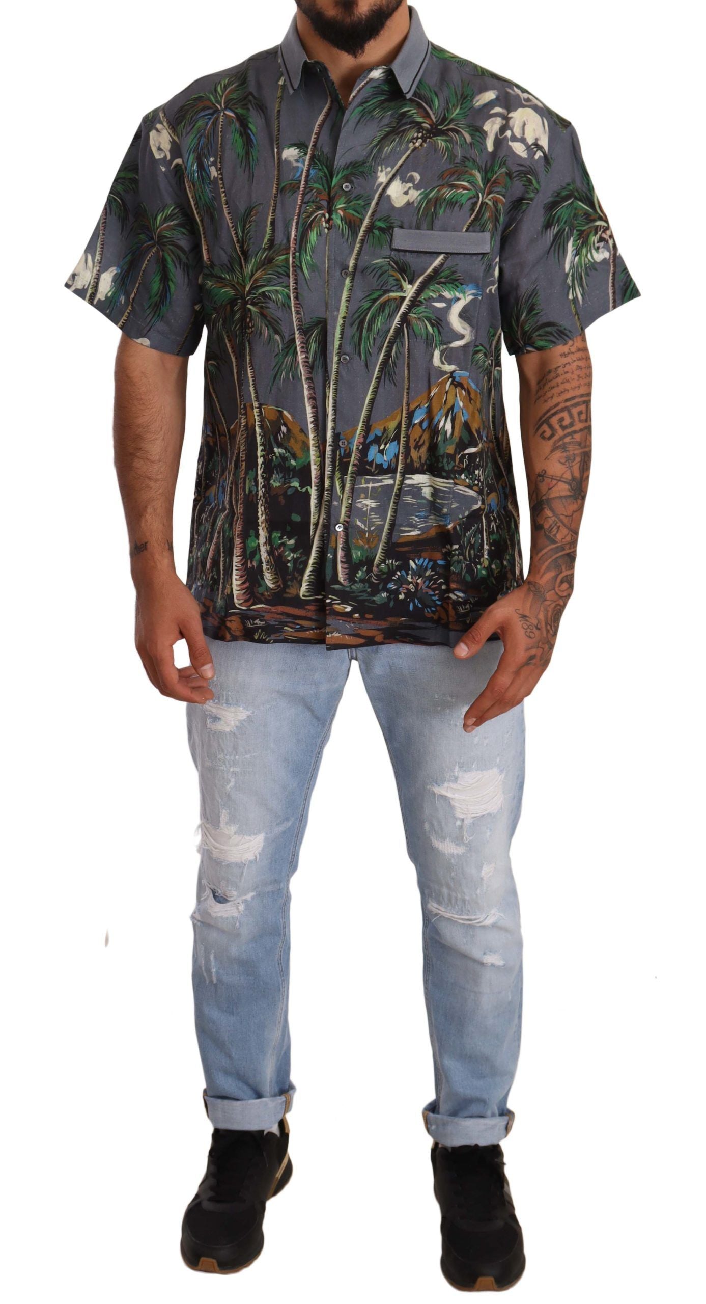 Chemise en lin gris Dolce & Gabbana avec motif tropical, col classique, tissu léger et élégant.