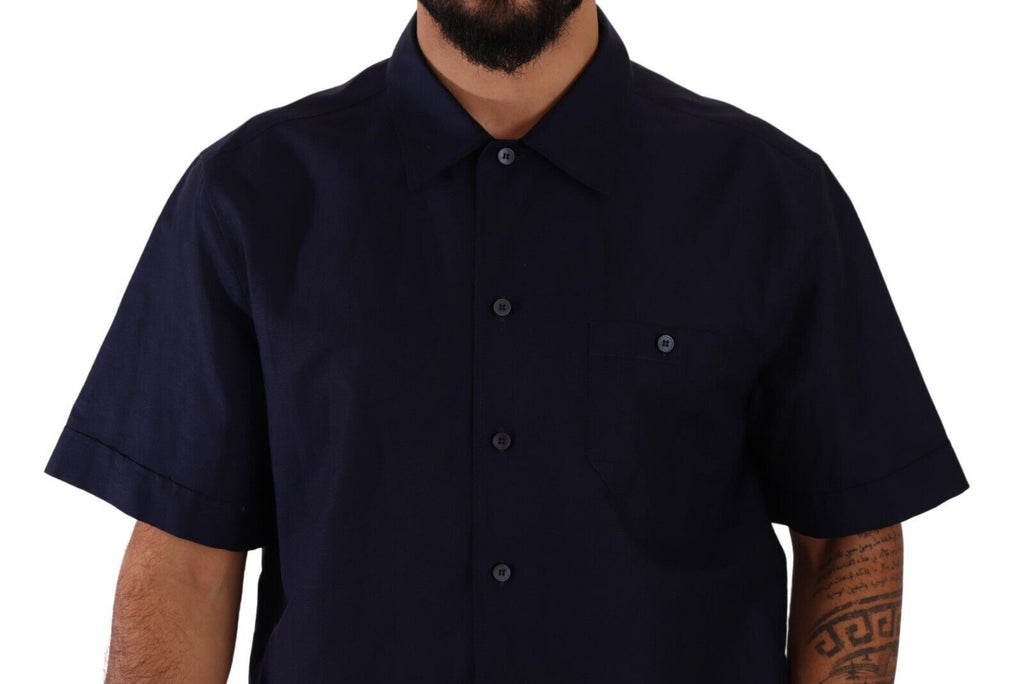 Chemise pour homme Dolce & Gabbana bleue marine à manches courtes avec boutons, élégante et moderne.
