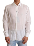 Chemise blanche en coton Dolce & Gabbana avec motif floral, style Martini, visible sur le modèle.