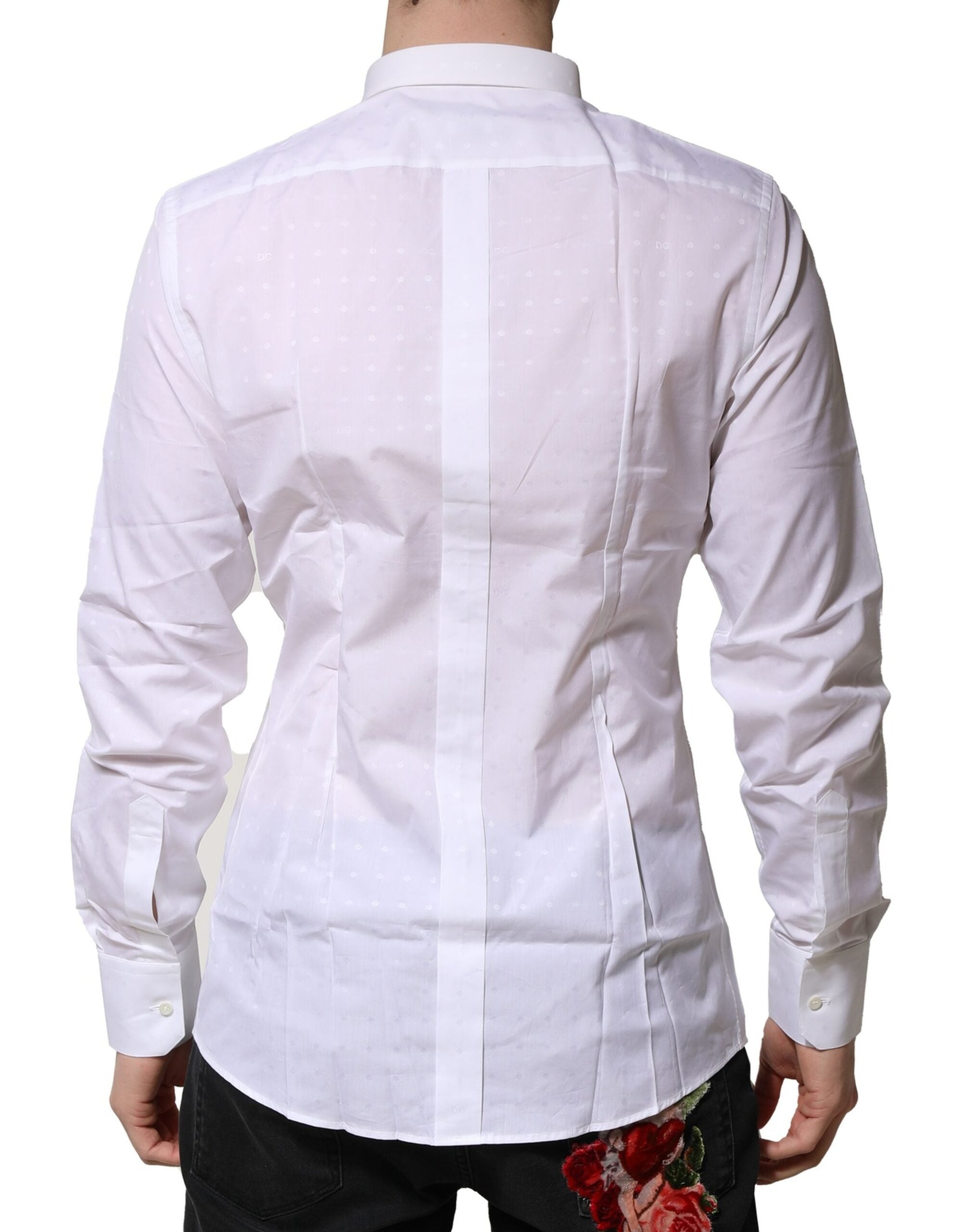 Chemise formelle blanche en coton Dolce & Gabbana avec manches longues et détails dorés visible sur l'image.