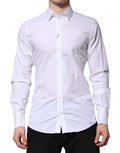 Chemise blanche en coton à manches longues Dolce & Gabbana, élégante, avec détails dorés pour une allure formelle.