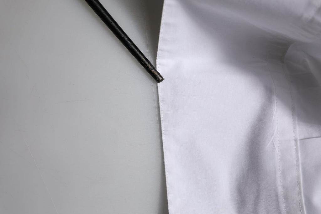Chemise blanche en coton à manches longues de Dolce & Gabbana, vêtement formel élégant pour femmes.