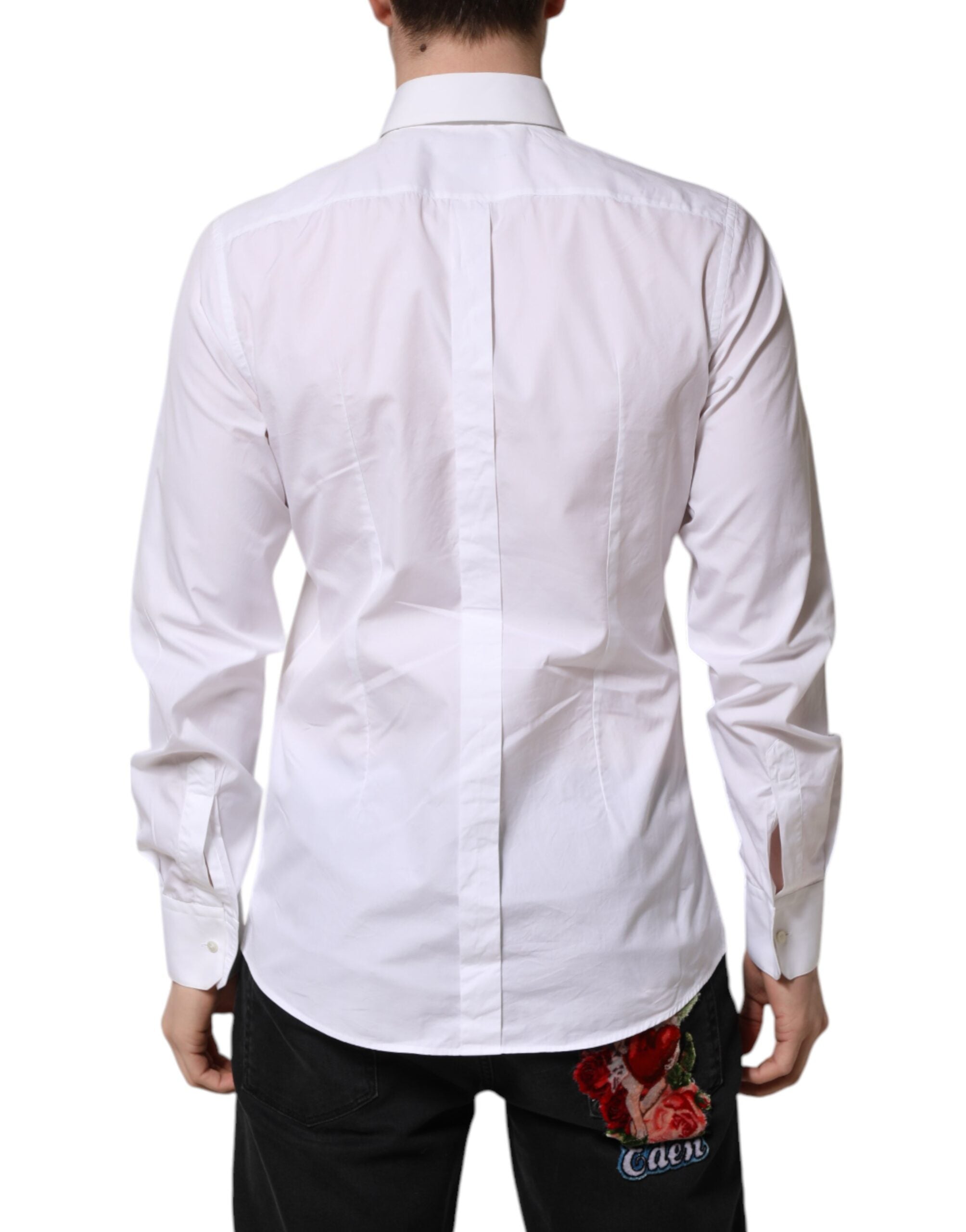 Chemise formelle blanche Dolce & Gabbana en coton avec détails dorés, élégante robe-bavoir chic pour femmes.