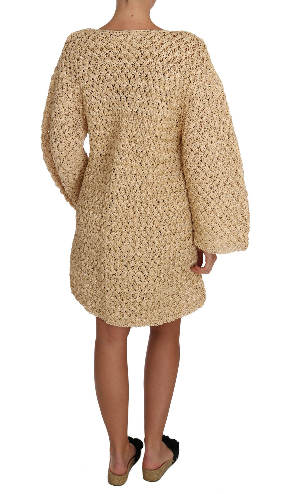 Cardigan beige en crochet en laine Dolce & Gabbana, tricoté avec des détails en rafia, porté sur un fond neutre.