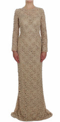 Robe longue beige à fleurs en dentelle Dolce & Gabbana, robe cintrée élégante avec détails floraux raffinés.